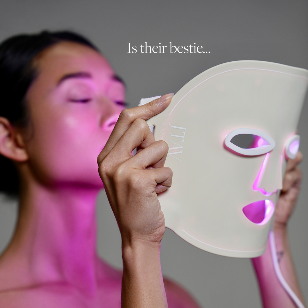 Carousel slide of woman putting on JTAV red therapy mask with text that reads, "is their bestie..."